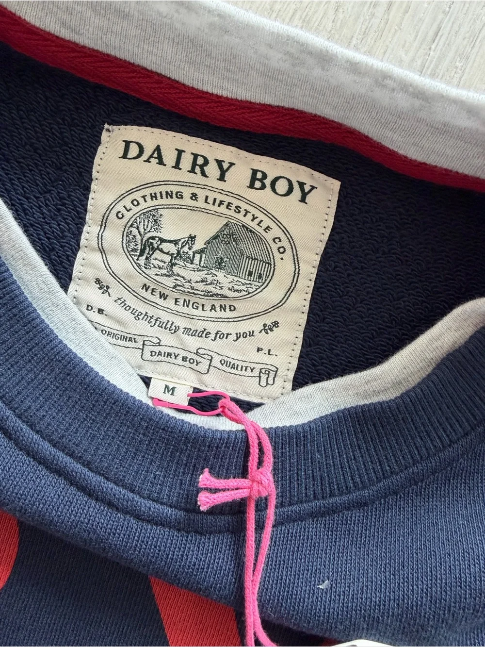 Dairy Boy Navy Sweatshirt with Red Tennis Graphic